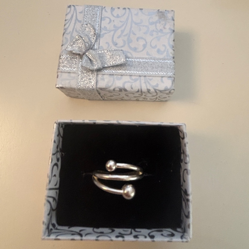 Elegant Silver Ring with Pearl Accents
